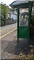 Side of a dark green bus shelter, Llanhilleth