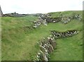 HY3826 : Broch of Gurness - Stone walls across ditch by Rob Farrow