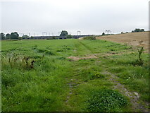 TL0056 : Farm track and railway viaduct near Radwell by Jonathan Thacker