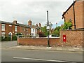 Wall postbox in College Lane