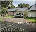 Welsh / English text painted on Black Rock Road, Monmouthshire