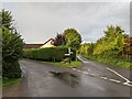 Road junction and house at Dipford