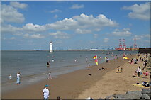 SJ3094 : Beach at New Brighton with view across to Liverpool2 container port by Rod Grealish