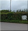 Directions opposite a junction in Llangors, Powys