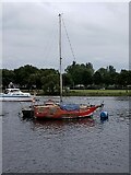 NS3975 : Red boat on the River Leven by Richard Sutcliffe