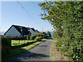 Houses on the road heading south into Sliddery, Arran