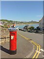 Criccieth postbox with sea-themed topper