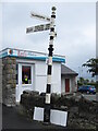 Fingerpost by the A5025 in Benllech, Anglesey