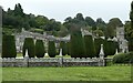 SX0863 : Lanhydrock - Yews in front of house and church by Rob Farrow