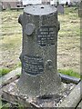 Unusual grave stone in churchyard