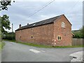 Barn conversion at Cae-lica road junction