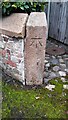 Benchmark on gatepost at entrance to Bruneval