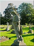 SE2337 : Leaning mourner statue, Horsforth Cemetery by Humphrey Bolton
