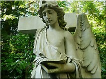 SE2639 : Young angel in the old part of Lawnswood Cemetery by Humphrey Bolton