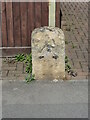 Old Milestone by UC road (Ermin Way), Ermin Street; 70m East of junction with Vicarage Lane in front No 89