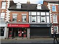 SO9570 : Vodafone and Carter Esquire (closed) at 69 & 71  High Street, Bromsgrove by Roy Hughes