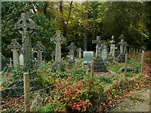 SE3337 : Crosses in the front graveyard, Roundhay St John's Church, Leeds by Humphrey Bolton