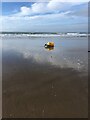SH5426 : Small yellow buoy on the beach by Eirian Evans