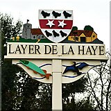 TL9620 : Layer de la Haye: Village Sign by Michael Garlick