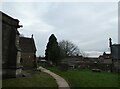 ST8271 : St John the Baptist, Colerne: path by Basher Eyre