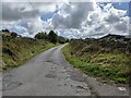 A much-repaired surface on the road to the quarries