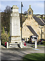NZ1635 : Crook: war memorial and church by Trevor Littlewood