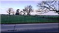 View into Highmoor Park through railings on north side of Syke Road