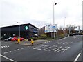 SJ9090 : Approaching Portwood Roundabout by Gerald England