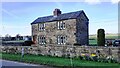 NY3052 : Holly House on north side of road at east end of Wiggonby by Luke Shaw