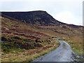 NC9315 : Mountain road beneath Beinn Dhorain by John Lucas