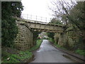 Disused railway bridge over Manley Lane