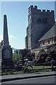 TQ2037 : War Memorial and church in the village by Peter Shimmon