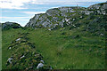 NR3691 : Cnoc Eibrigin and its standing stone by Julian Paren