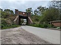 Railway bridge over lane near Stapleton