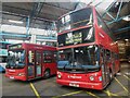 Two preserved Stagecoach buses inside Barking Bus Garage