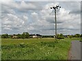 Power lines and houses at Nosterfield End