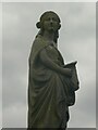 Close view of the mourner statue in Pudsey Cemetery