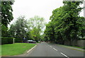 The B4086 passing the entrance to Stratford-on-Avon Golf Course