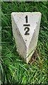 ½-mile Leeds & Liverpool Canal milepost on NE side on canal NW of Bridge 214A