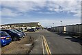 Southeast view along Seaford Esplanade towards Cliff End, East Sussex