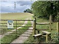 Stile and footpath to pylon