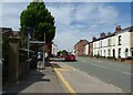 Bus stop and shelter on Beech Lane (A538)