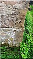 Benchmark on farm building on south side of road at Nova Scotia