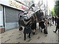 Dragon walking down Kirkgate, Wakefield