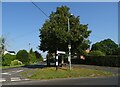 Road junction with fingerpost, Acton Bridge