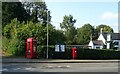 Elizabeth II postbox and telephone box on Station Road, Crowton