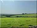 A stone barn and a new bungalow on a drumlin overlooking the Dunnywater Valley