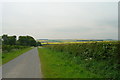 SE9345 : Country lane near South Dalton Wold by Ian Lavender