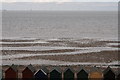 Beach huts and incoming tide, Herne Bay