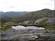 NG8474 : Lochan on secondary summit of An Groban by Roger McLachlan